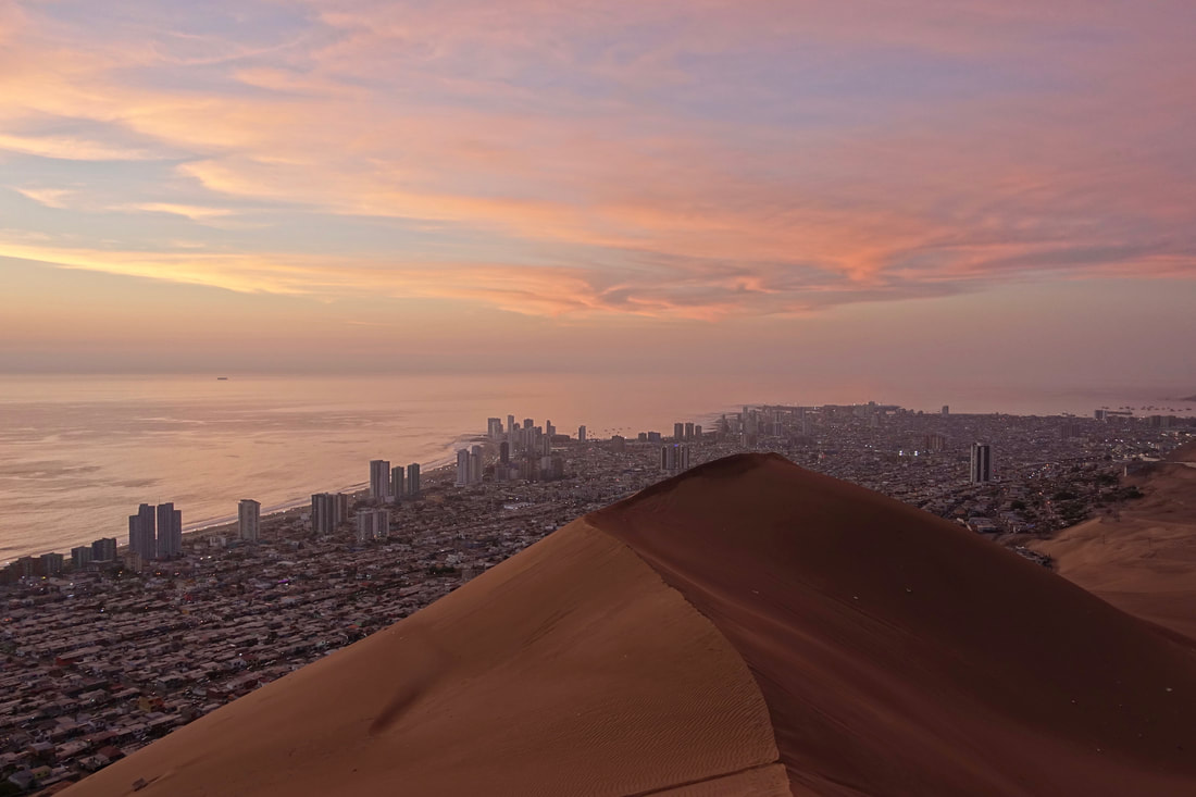 Sunset above the city of Iquique on Cerro Dragon