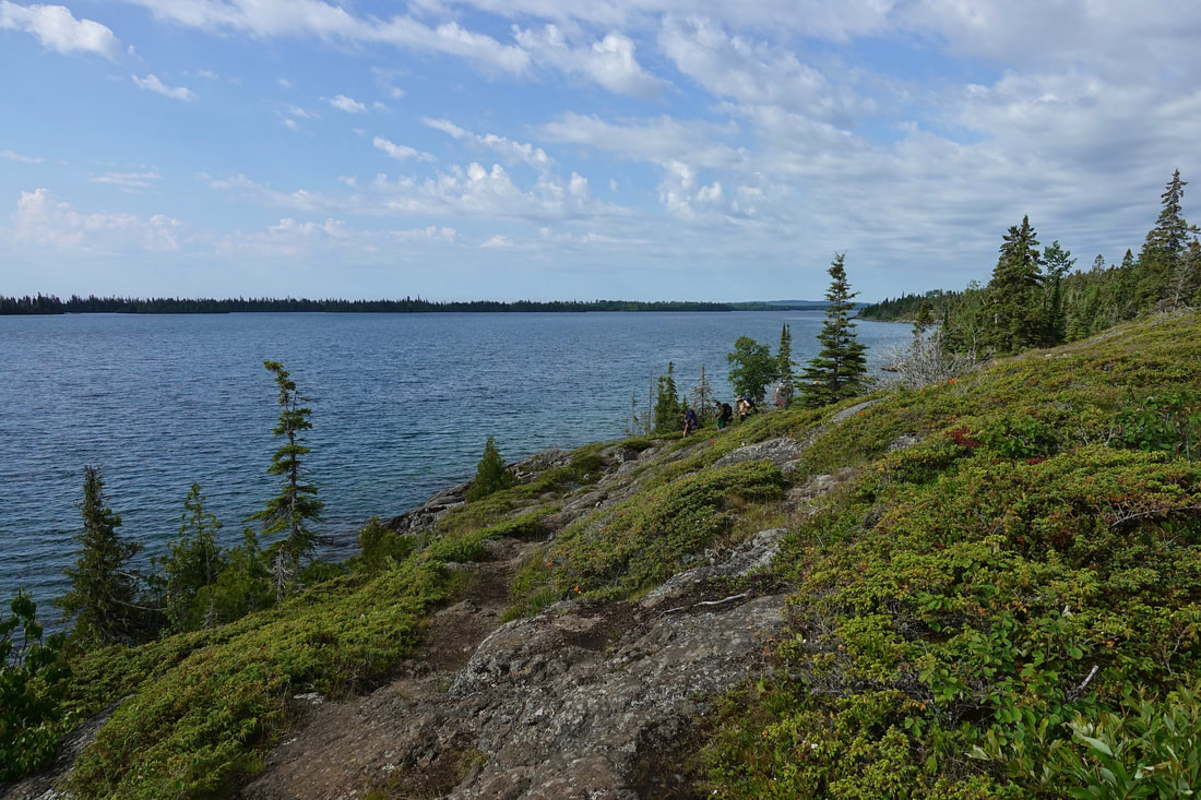 Hiking along the Three mile trail in Isle Royale Michigan