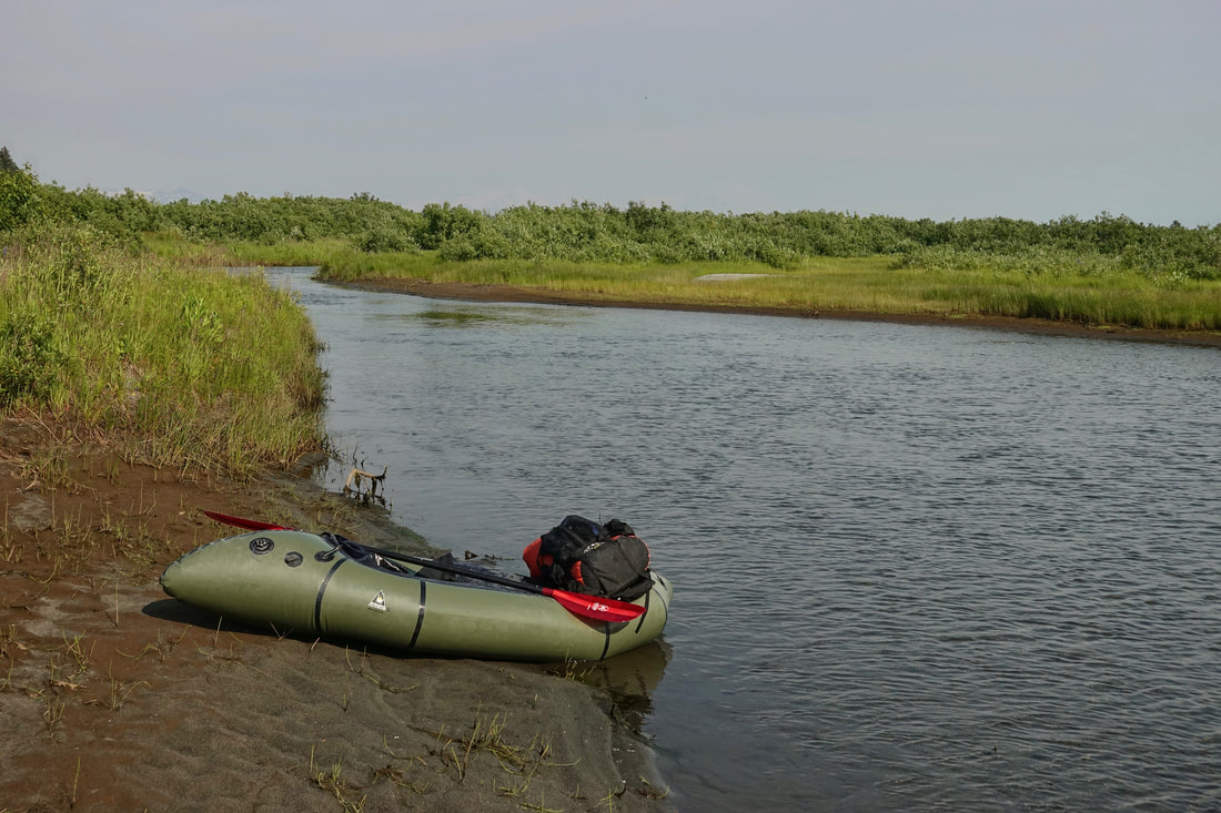 Packraft on the Awke River along the Lost Coast in Alaska