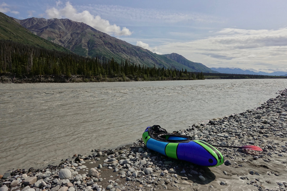 Packrafting the Kaskawulsh river in Kluane National Park in the Yukon